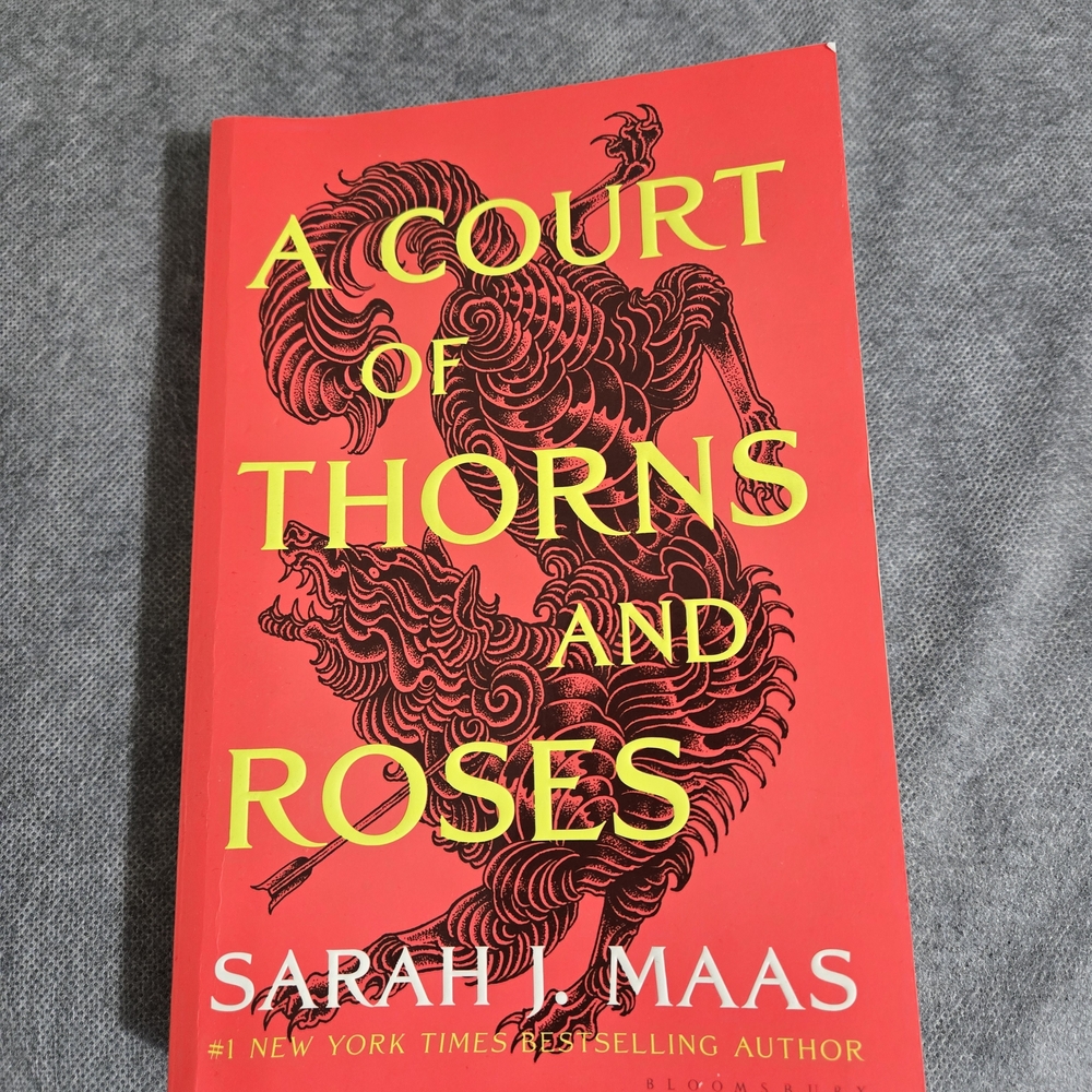 A Court Of Thorns And Roses by Sarah J. Maas